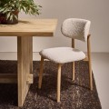 Krzesła na drewnianych nogach z tapicerką bouclé Hazel, off-white, 2 szt - Pomax