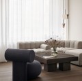 Designerski fotel tapicerowany Hippo Lounge, boucle Barnum - NORR11