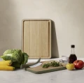 Green tool bamboo cutting board with juice groove - Eva Solo